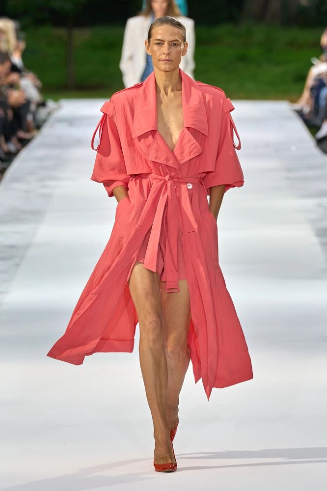 Coral trench dress belted at the waist with a fluid open skirt, Stella McCartney S/S 27, Paris.