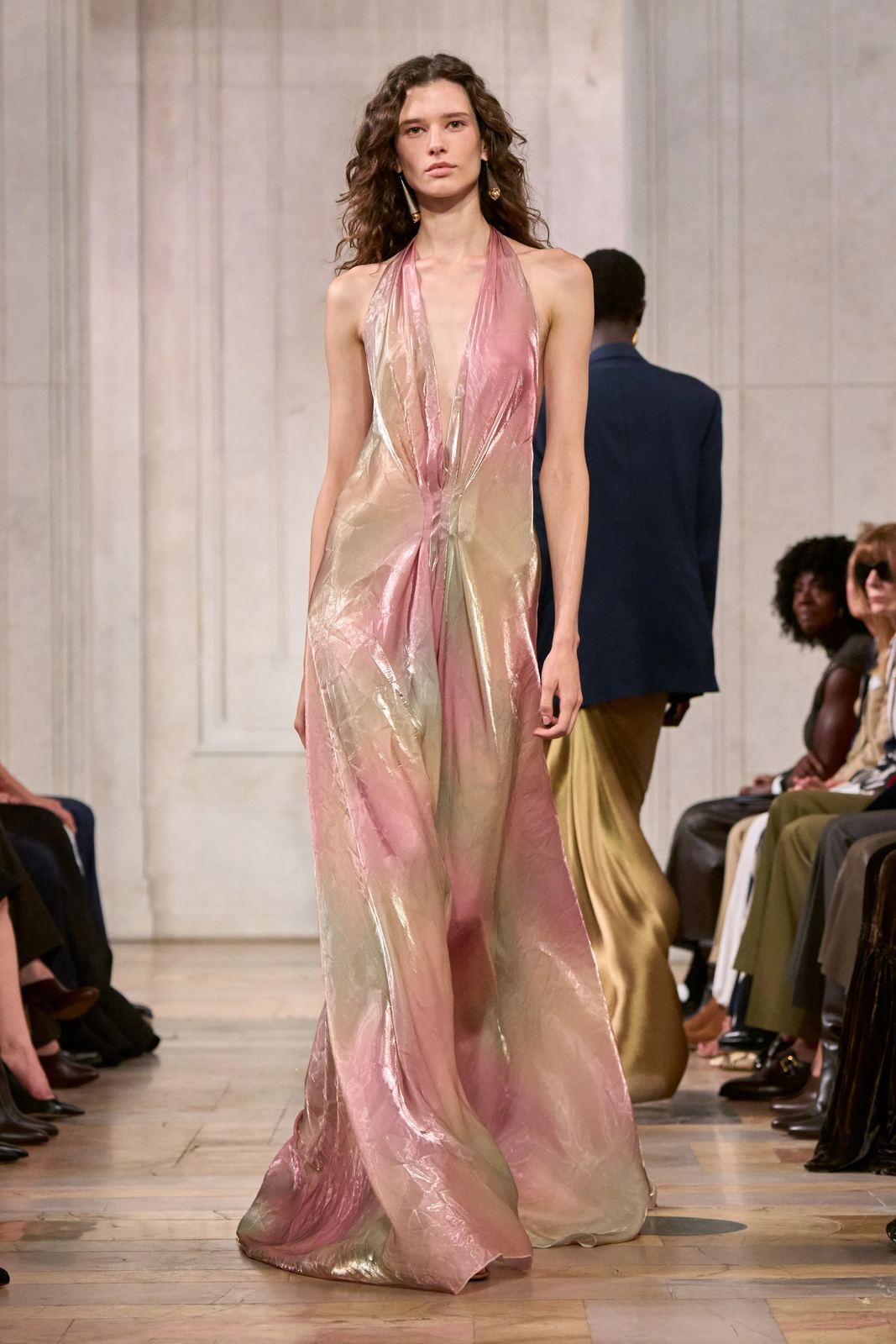 Iridescent rose and gold halter gown in liquid lamé, Ralph Lauren S/S 27, New York.