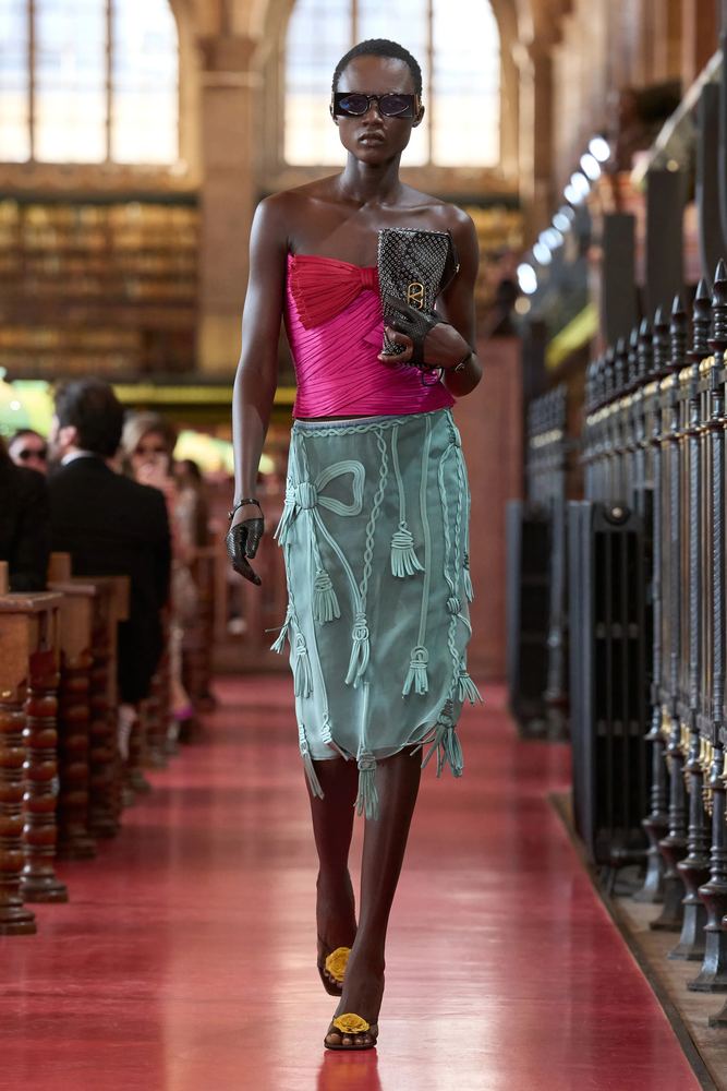 Fuchsia draped bustier over a turquoise tasselled skirt, Valentino S/S 27, Paris.
