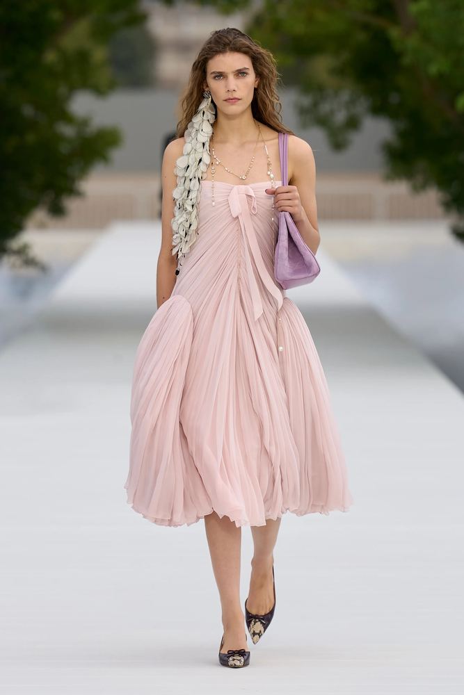 Powder pink pleated chiffon dress with a bow at the neckline, Christian Dior S/S 27, Paris.
