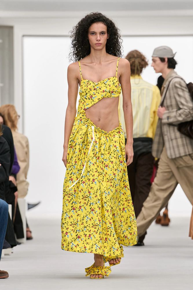 Sunshine yellow floral dress with a cut-out waist and ruffled straps, Loewe S/S 27, Paris.