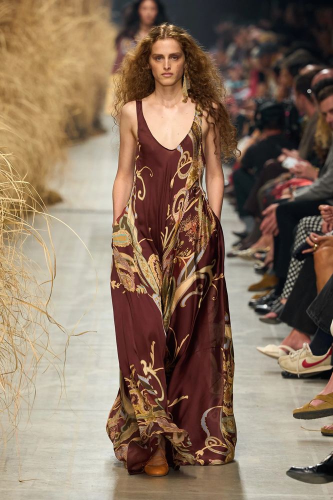 Oversized bordeaux and gold paisley on a fluid silk maxi dress, Etro S/S 27, Milan.