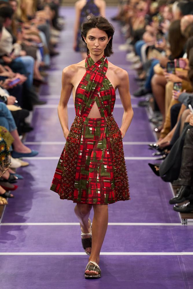 Red and green plaid on a crossed halter top and a bead-studded skirt, Miu Miu S/S 27, Paris.