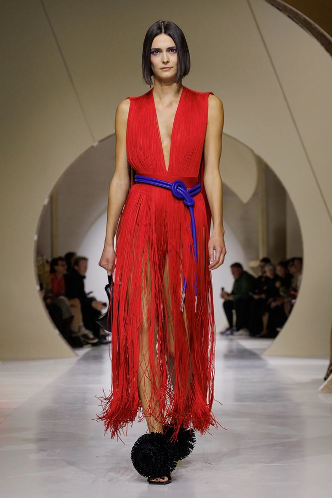 Red fringed dress with a plunging V-neck, tied at the waist with a cobalt cord, Givenchy S/S 27, Paris.